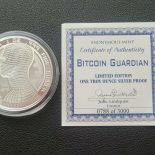 2009 – CRYPTO! BITCOIN GUARDIAN COMMEMORATIVE 1 OZ SILVER PROOF ROUND CAPSULE & COA